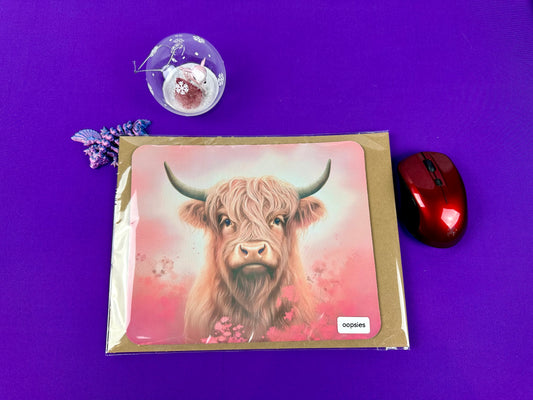 Oopsie Highland Cow in Pink Field Mousepad